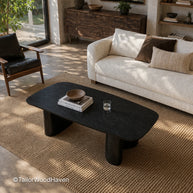 Solid wood rectangular coffee table with black finish and smooth surface