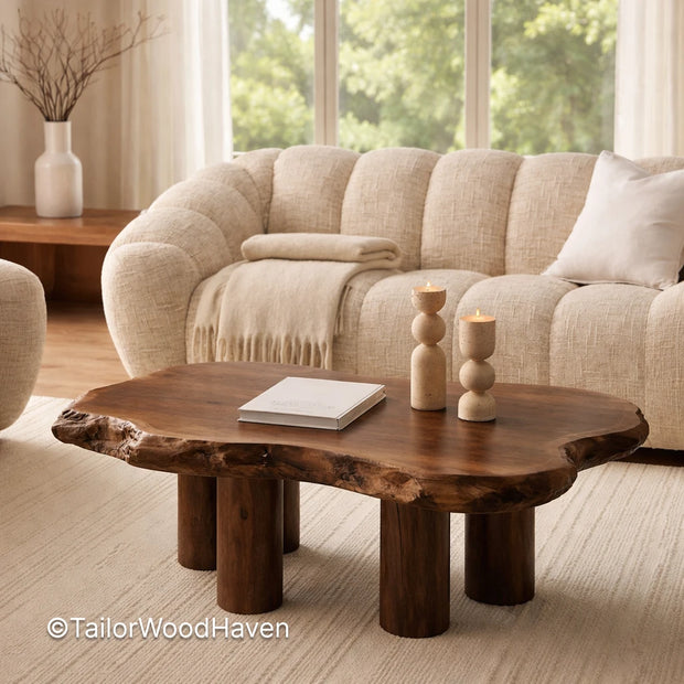 Small oval coffee table in solid wood with compact design and smooth surface