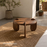 Minimal small round wood coffee table with smooth surface and clean edges
