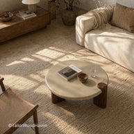 Minimal white round coffee table with clean edges and balanced shape