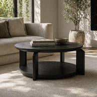 Round coffee table with black finish and simple modern style