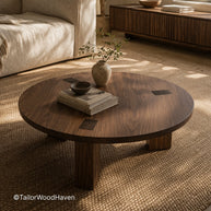 Solid wood round coffee table placed as a central piece in a living room