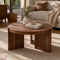 Solid round wood coffee table designed for everyday use with natural grain variation