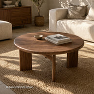 Solid wood circular coffee table with durable surface and natural variation
