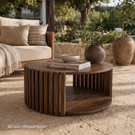 Round wooden coffee table with balanced shape and natural grain detail