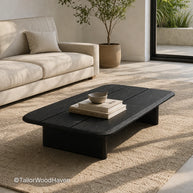 Solid black wood coffee table designed for everyday use with durable surface