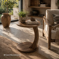 Small wooden round coffee table designed for tight living spaces