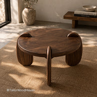 Simple small round wood coffee table with stable construction and space-saving form