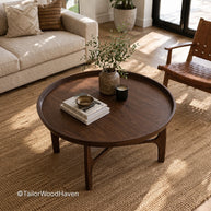 Simple round dark wood coffee table with stable construction and rich tone
