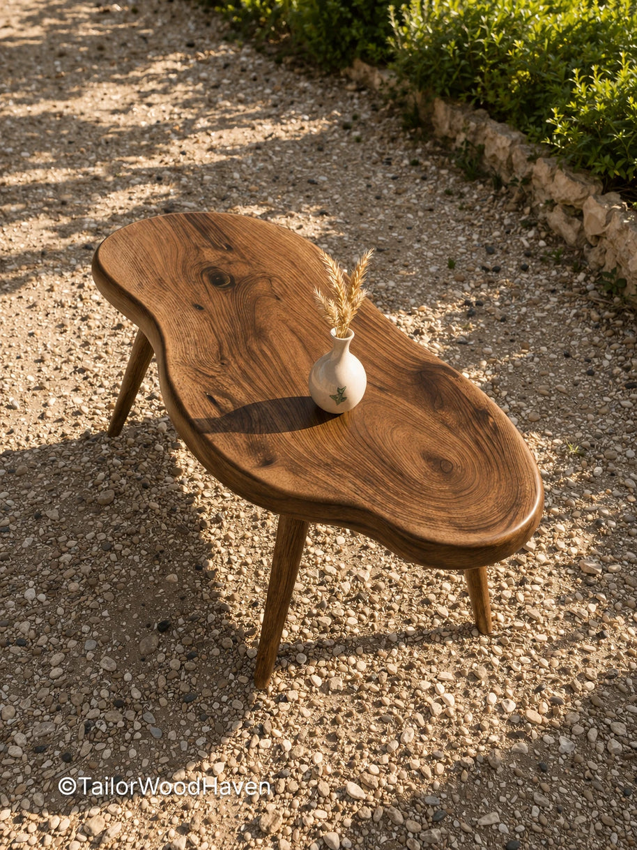 Minimal oval outdoor coffee table with sturdy construction and smooth tabletop