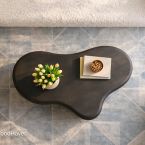 Solid wood oval coffee table for living room with clean edges and durable finish