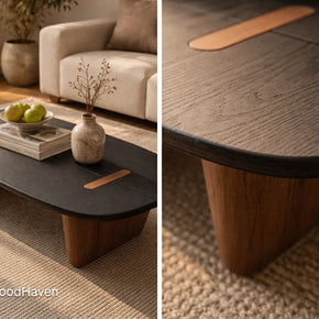 Dark wood oval coffee table with smooth surface and balanced design