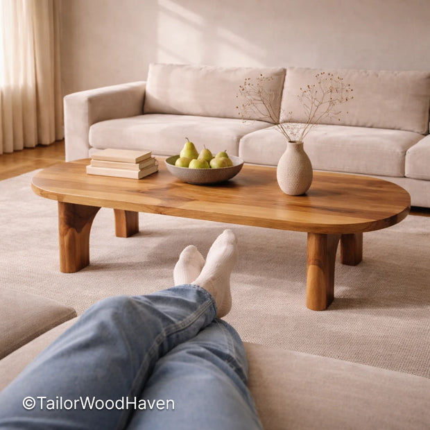 Oval coffee table in solid wood with clean edges and durable finish