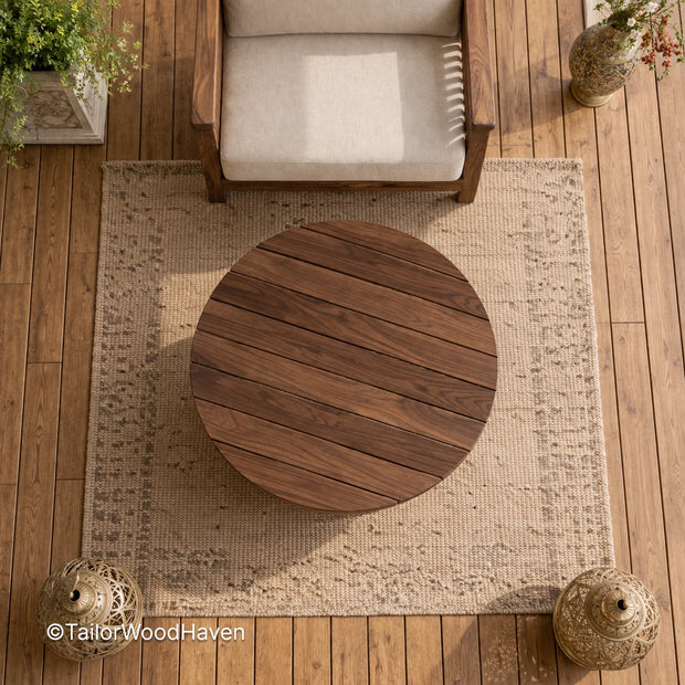 Circular patio coffee table with durable wood construction and clean edges