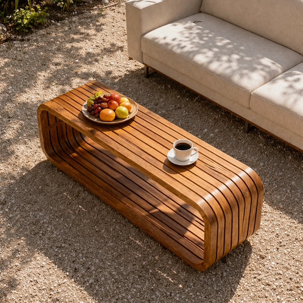 Contemporary patio coffee table with clean edges and durable wood construction