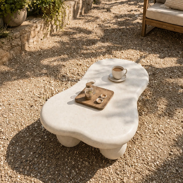 Solid wood outdoor coffee table with white finish and structured form