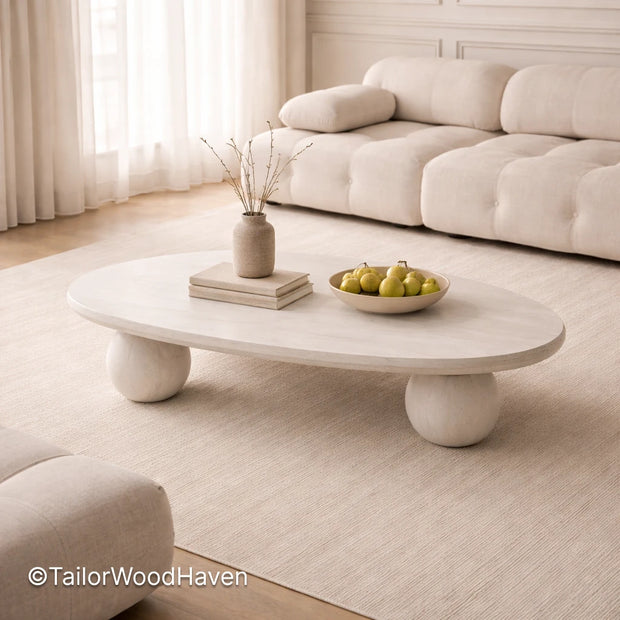 Solid wood white oval coffee table with clean edges and durable finish