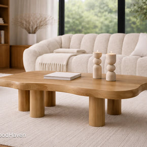 Wooden coffee table in a living room with a beige sofa and decor.