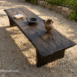 Modern black patio coffee table with durable construction and smooth tabletop