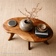 Mid century modern oval coffee table in solid wood with clean lines and smooth surface