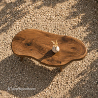Solid wood oval patio coffee table with clean edges and balanced proportions