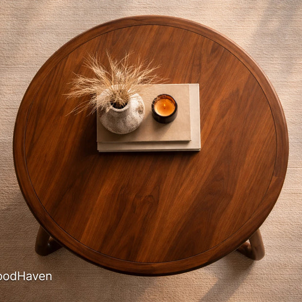 Solid wood brown oval coffee table with clean edges and durable finish