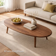 Contemporary oval coffee table in solid wood with smooth surface and modern design