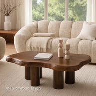 Small oval coffee table in solid wood with compact design and smooth surface