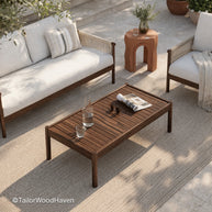 Rectangular patio coffee table with clean lines and durable wood surface
