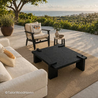Black square coffee table with clean edges and modern minimalist design