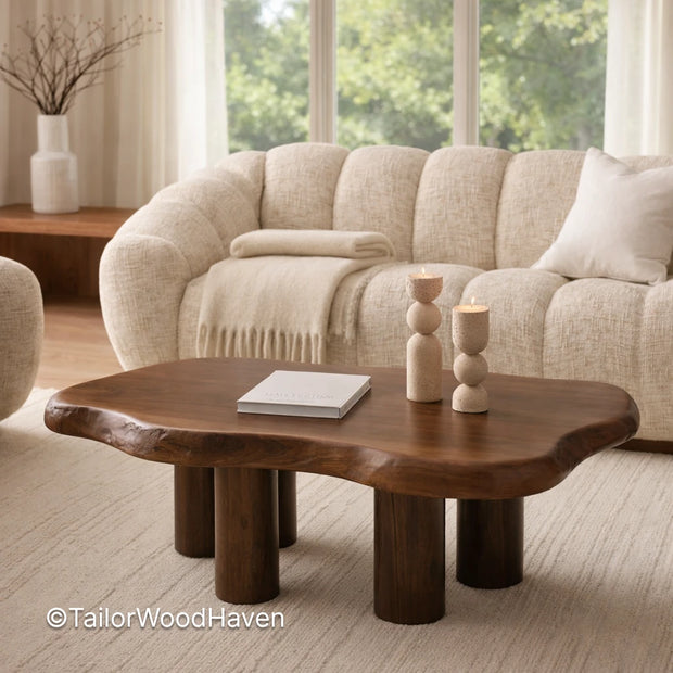 Small oval coffee table in solid wood with compact design and smooth surface