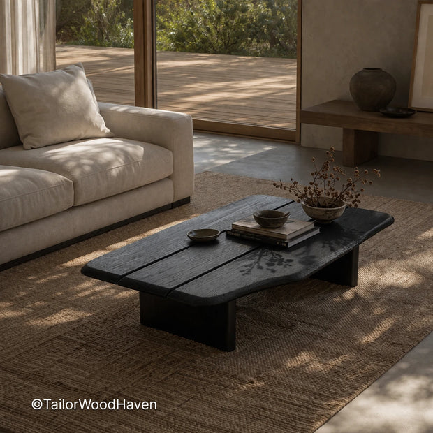 Black solid wood coffee table with clean edges and smooth finish
