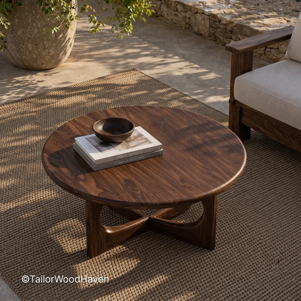 Round mid century coffee table with solid wood and natural grain