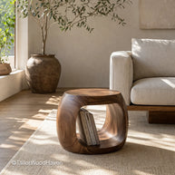Round coffee table for small spaces with compact design and smooth surface in a cozy living room