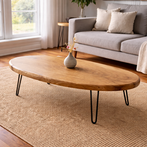 Traditional oval coffee table in solid wood with smooth surface and classic design