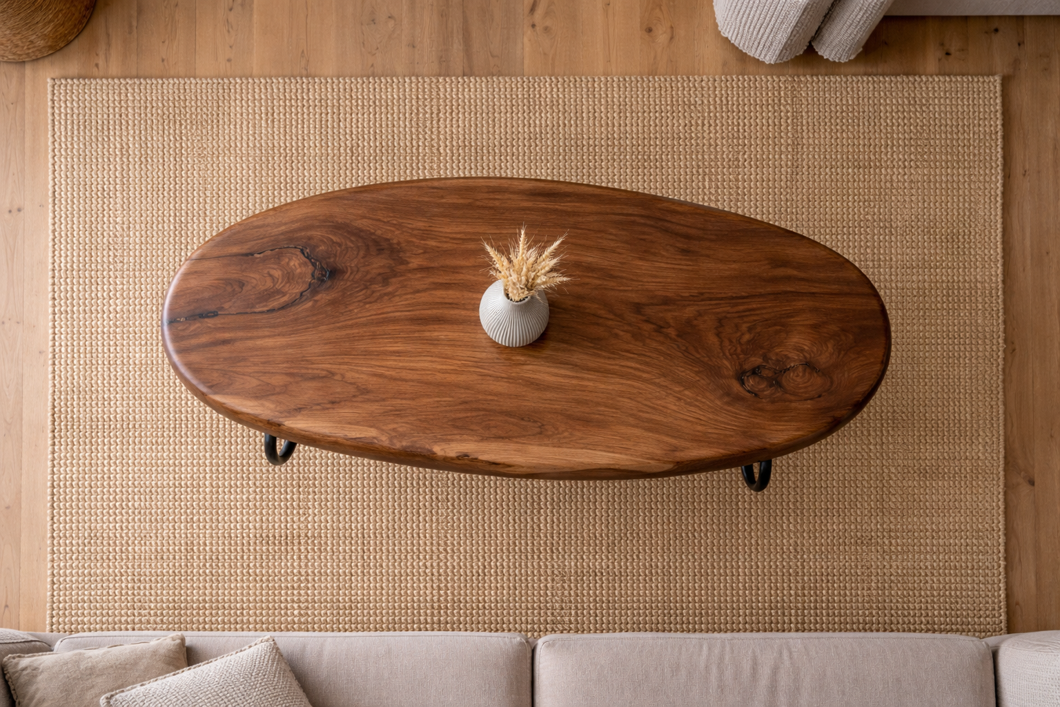 Solid wood traditional oval coffee table with clean edges and timeless style