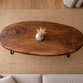 Solid wood traditional oval coffee table with clean edges and timeless style