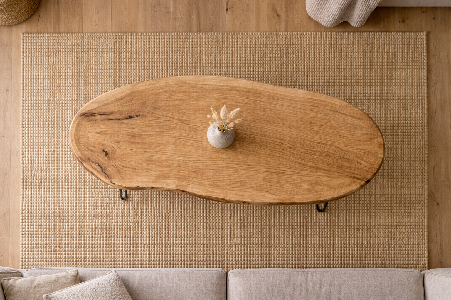 Solid wood traditional oval coffee table with clean edges and timeless style
