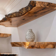 Farmhouse floating shelves made from distressed wood with natural texture and bracket free design, ideal for adding warmth to rustic living spaces