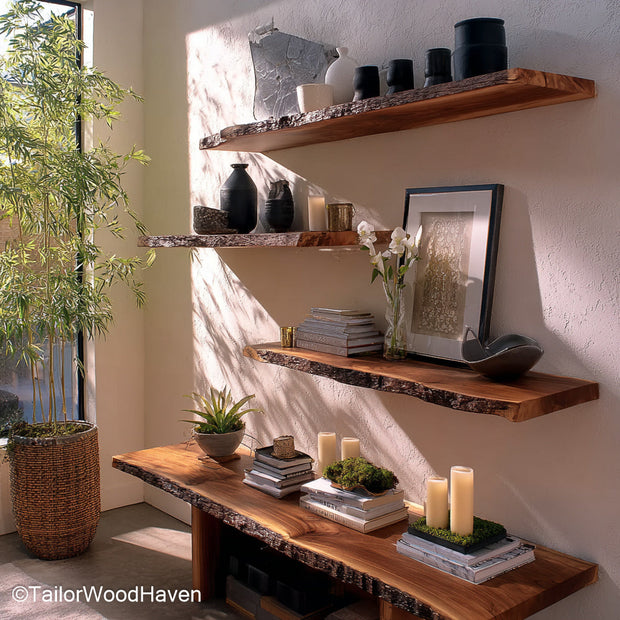 Live edge wall shelf made from a solid slab with raw edge and slim floating profile, suitable for bedrooms, entryways, or kitchen walls