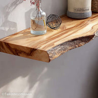 Reclaimed wood wall shelf made from salvaged timber with unique grain patterns and a floating mount, ideal for farmhouse or eco friendly homes