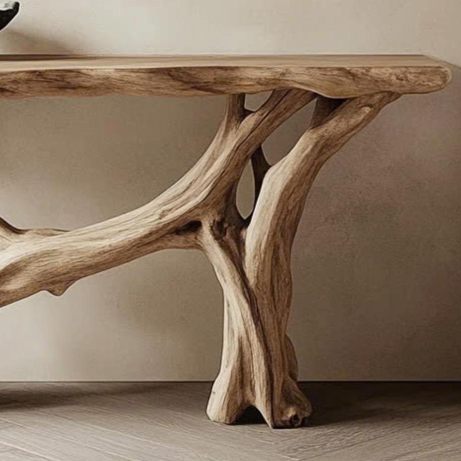 Close view of the rustic entryway table's branching base