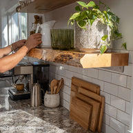 Kitchen rustic floating shelves crafted from distressed wood with sealed surface and floating hardware, perfect for rustic kitchen walls