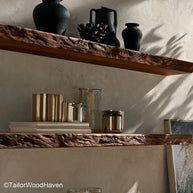 Floating walnut shelves built from solid walnut slabs with natural texture and hidden mounts, great for stylish open storage across home spaces
