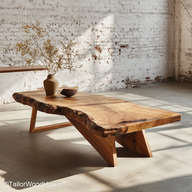 Natural live edge coffee table built with solid timber and a hand shaped edge that highlights its grain, perfect for cozy or earthy interiors