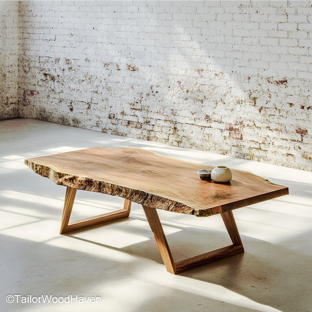 Rustic wood slab coffee table made from reclaimed timber with aged character and solid leg frame, perfect for farmhouse or cottage style homes