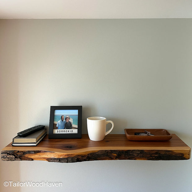 Floating shelves for living room made with natural hardwood and minimalist lines, designed for modern open wall displays