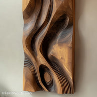 Modern wood wall decor crafted from layered hardwood with geometric symmetry and clean lines, perfect for living rooms or minimalist interiors
