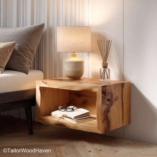 Floating bedside table narrow designed for tight layouts with a slim profile and hidden wall support, made from hardwood with natural grain