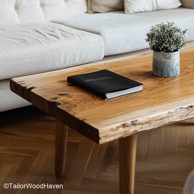 Pine live edge table designed from solid pine with a raw edge and clear grain, this piece fits rustic dining nooks or relaxed coffee corners